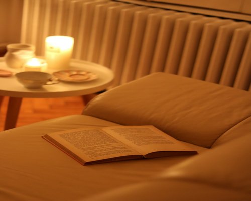 Relaxing evening at home with a book and tea
